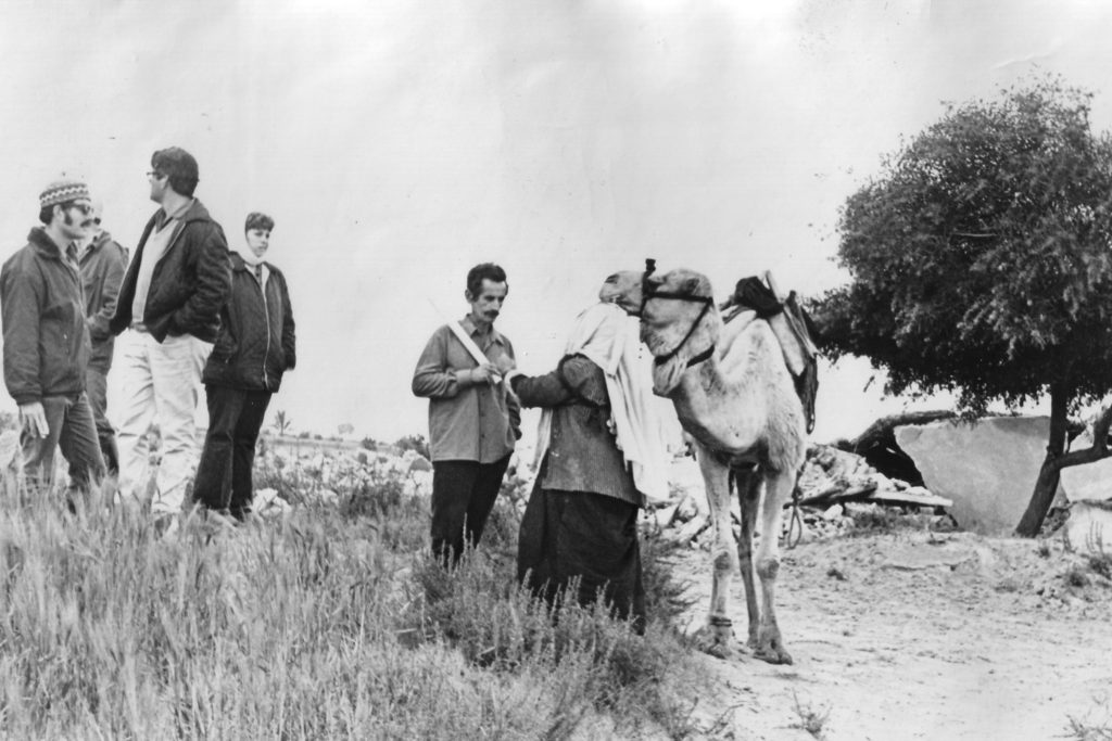 EXPELLED: Members of kibbutzim from southern Israel meet a Beduin next to the ruins of her house, northeast Sinai, 1972. (Oded Lifshitz)